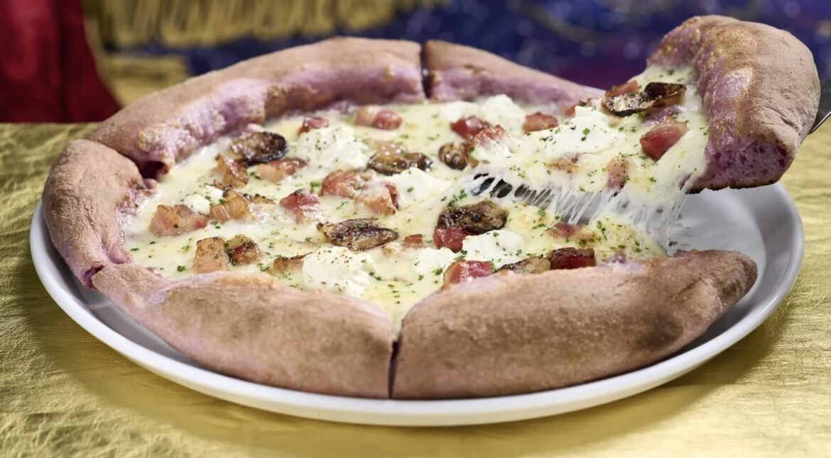 Concept art of a theme park entrance with a large, ornate clock tower captures the vibrant energy of visitors strolling through the plaza under an orange sky. This daily recap reveals the charm of domed buildings and decorative lamps that illuminate the enchanting scene.
